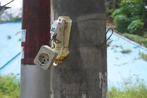 The power plug is broken on the electric pole Stock Photos