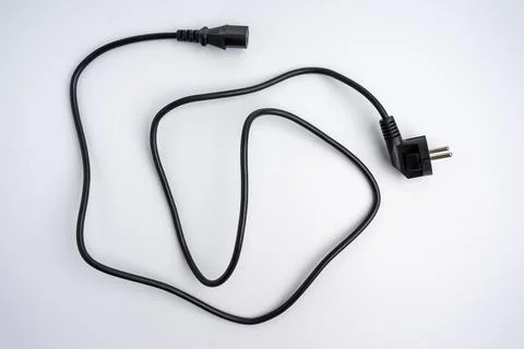 Power plug, computer power cord on a white background. 库存照片