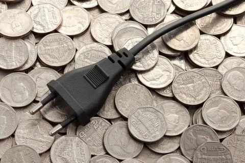 Power plug on money Stock Photos