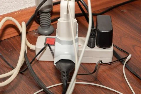 Power plug in a socket Stock Photos