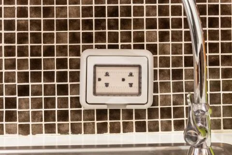 Power plug socket with waterproof protection or outlet cover, plug housing Foto stock