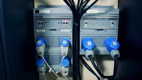 Power plugs of cables connected to sockets Video stock 99085745