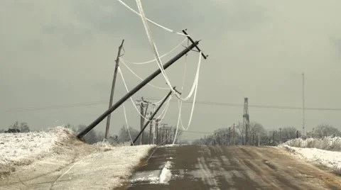 Power pole broken in street from ice storm 스톡 동영상 59685194