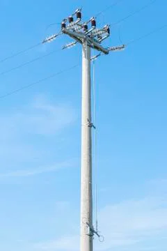 Power pole with external electric separator on top Stock-Fotos