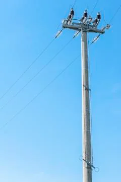 Power pole with external electric separator on top Foto stock