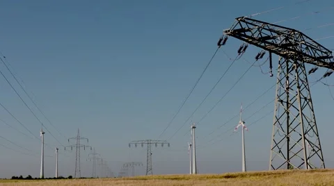 Power Pole In Front of Wind Turbines Video stock 64575705