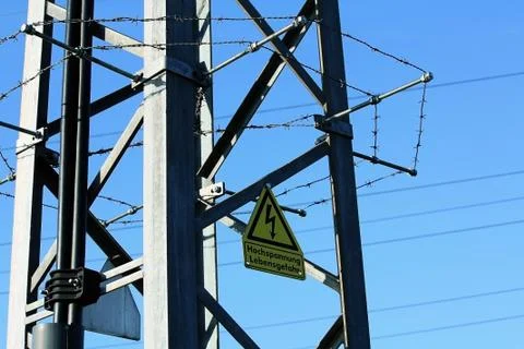 Power pole with high voltage warning Stock Photos