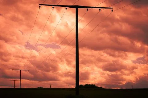 Power pole in sunset Stock Photos