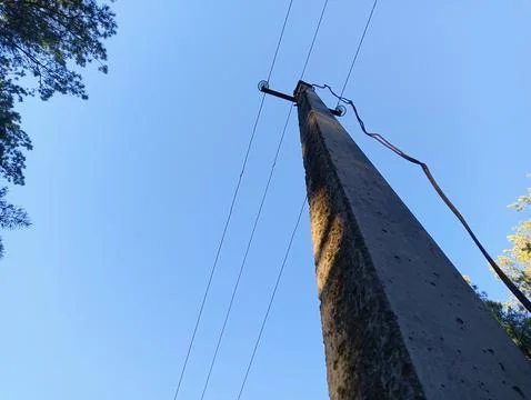 Power pole. Top of an old electrical pole with plugs and wires on a sky bac.. Stock Photos