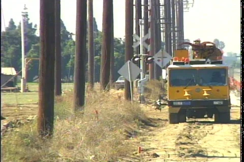 POWER POLES AT CONSTRUCTION Stock Footage 1049520