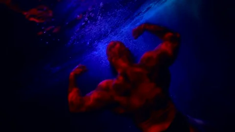 Power of Poseidon inside sea or ocean, brawny man silhouette in dark and Video stock 169859607