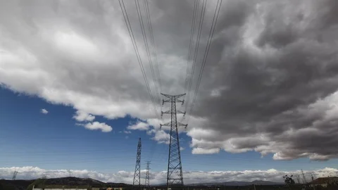 Power posts and clouds forming a storm, Timelapse 4k Stock-Footage 91805774