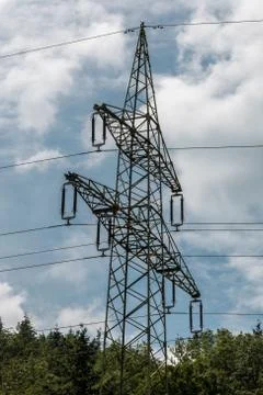 Power pylon on the green field Stock Photos