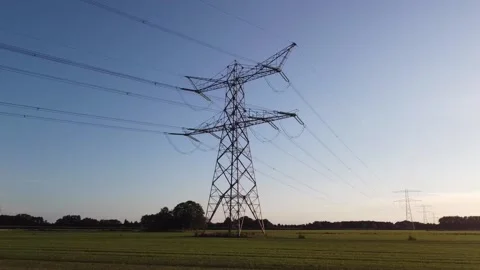 Power Pylon at sunset 01 Stock Footage 145953712