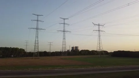 Power Pylons at sunset 02 Stock Footage 145953711