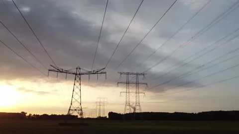 Power Pylons at sunset 03 Stock Footage 145953690