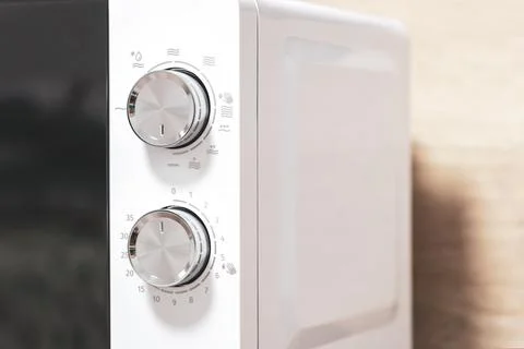 Power regulator, temperature control. Microwave Oven. Close-up. Stock Photos