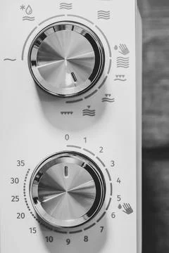 Power regulator, temperature control. Microwave Oven. Close-up. Stock Photos