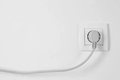 Power socket and plug on white background. Electrician's equipment Stock Photos