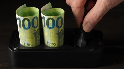 Power socket with Euro banknotes. Concept of energy costs and electricity bill Stock Footage 307760367