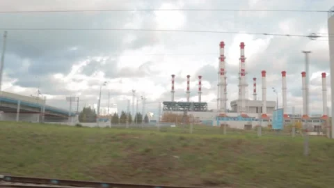 Power station pipes view from the train window. 스톡 동영상 165418083