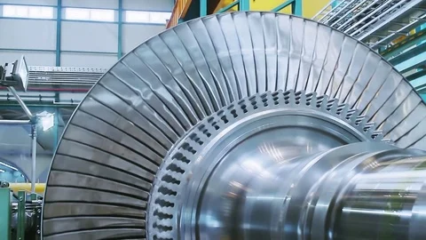 Power steam turbine rotates at a heavy industry plant Stock Footage