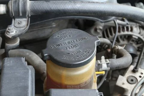 Power steering fluid cap Stock Photos