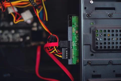 Power supply cable And sata cable plugged into the computer hdd Stock Photos