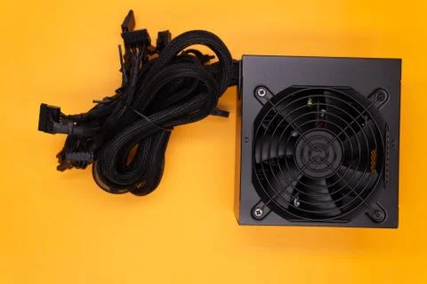 The power supply for the computer isolated on white background . Stock Photos