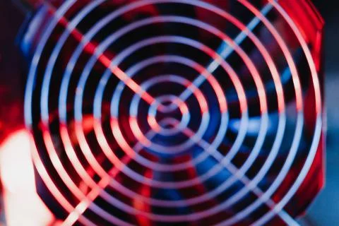 Power supply cooler Electronics technology concept details blue red light bac Stock Photos