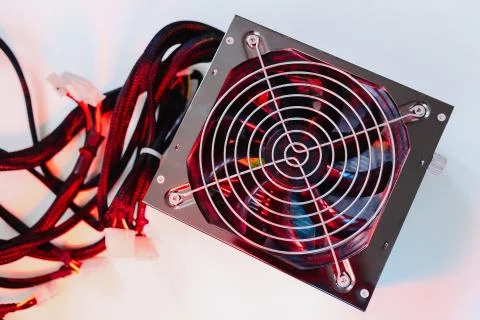 Power supply Electronics technology concept white background details blue red Stock Photos