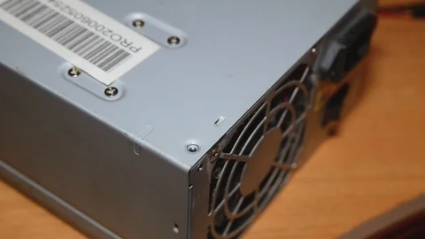 Power supply repair. Computer technician is disassembling a computer. Stock Footage 102954592
