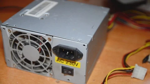 Power supply repair. Computer technician is disassembling a computer. Stock Footage 102954626