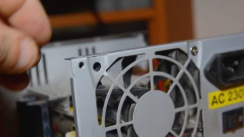 Power supply repair. Computer technician disassembles a computer. master install Stock Footage 102955255