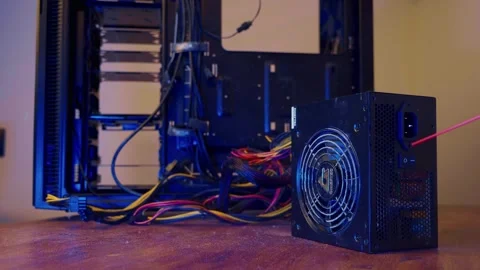 Power supply unit with fan close up. technician using compressed air spray Stock Footage 276918041