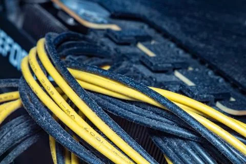 Power supply unit internal components with yellow and black cables detailed 스톡 사진