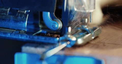 The power tool jigsaw saws the board. A sharpened saw passes through the wooden Video stock 166283971