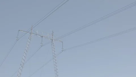 Power Tower with electrical cables against a blue clear sky on a sunny day(VLOG) Stock Footage 97463298