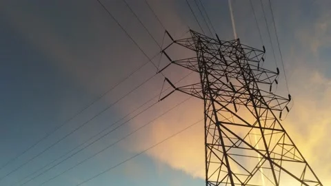 Power tower in front of sunset - Drone camera goes right and left Video stock 141419056