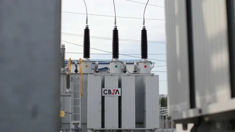 Power transformer with ceramic insulators and company logo 스톡 동영상 156318131