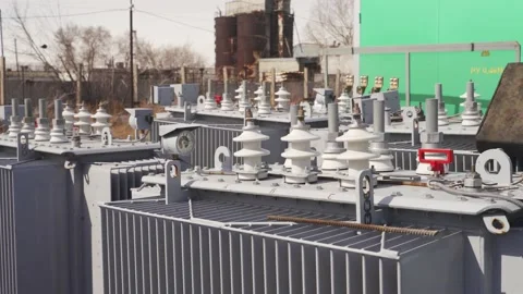 Power transformer at electrical distributing substation warehouse. High voltage Vídeo Stock 156206213