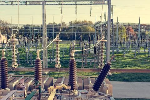 Power transformer powering electrical switchyard. Stock Photos