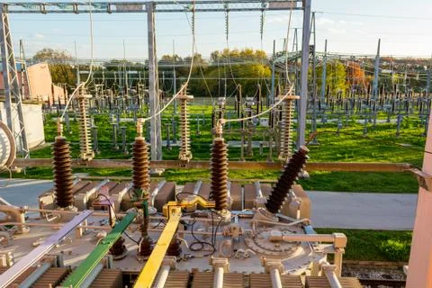 Power transformer powering electrical switchyard. Stock Photos