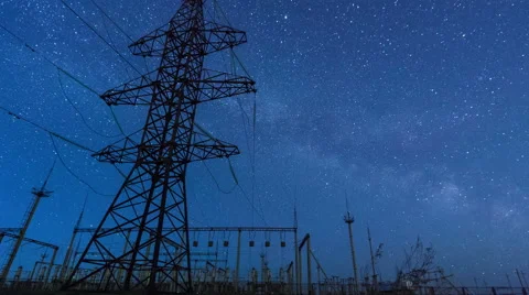Power transmission line tower on a starry sky Stock Footage 64836871