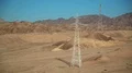 Power transmission towers in desert HD Footage
