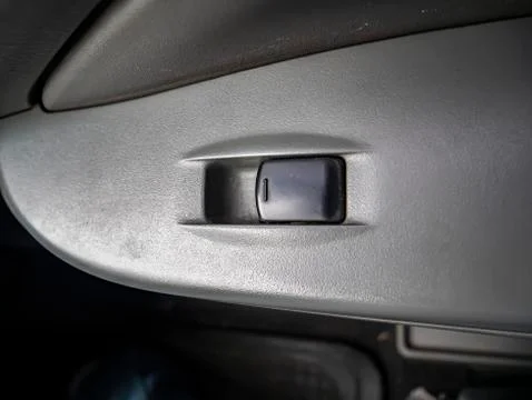 Power window button of a car. Photos