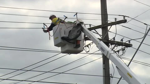 Power worker working on line Stock Footage