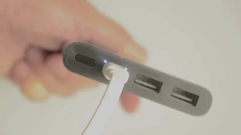 The powerbank is charging.The charge indicator flashes Video stock 219088365