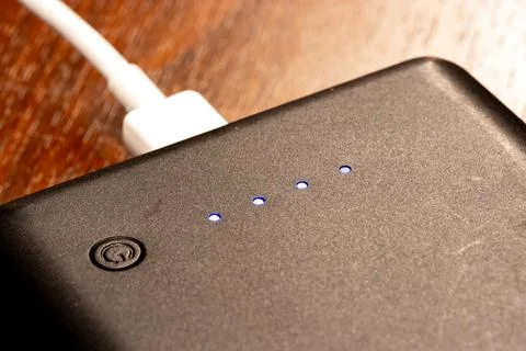 Powerbank in the process of being charged Stock Photos
