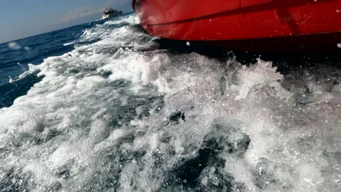 Powerboat, bottom corner view. Waves crash at high speed on the side of the s Video stock 169992973